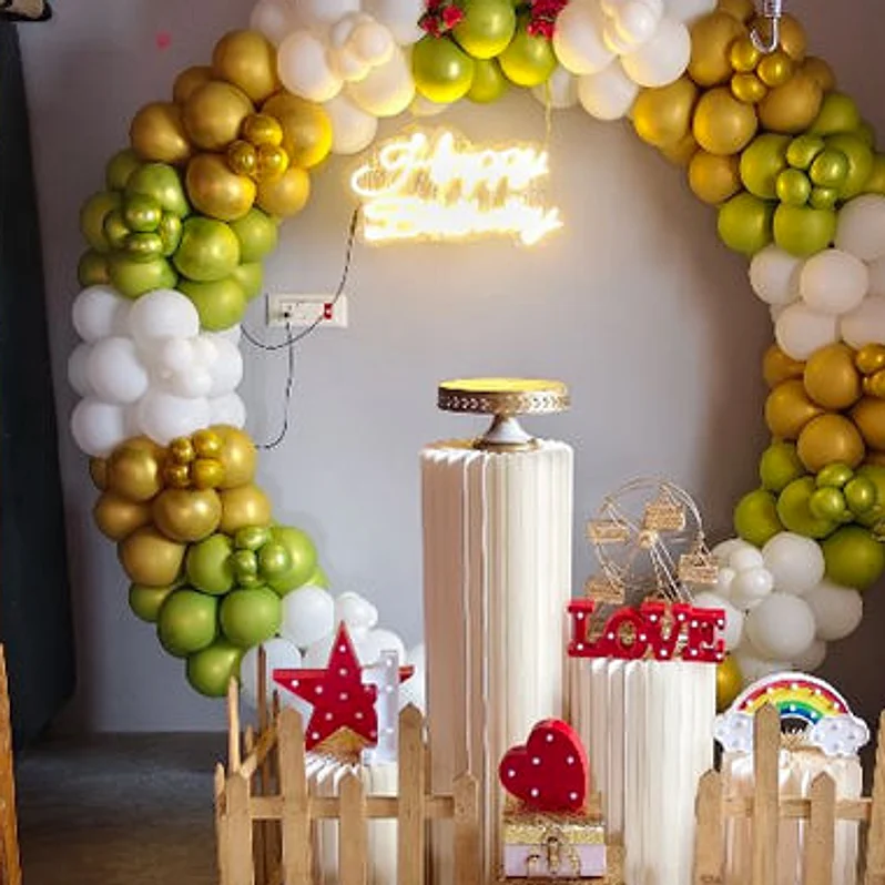 A balloon arch with name letters